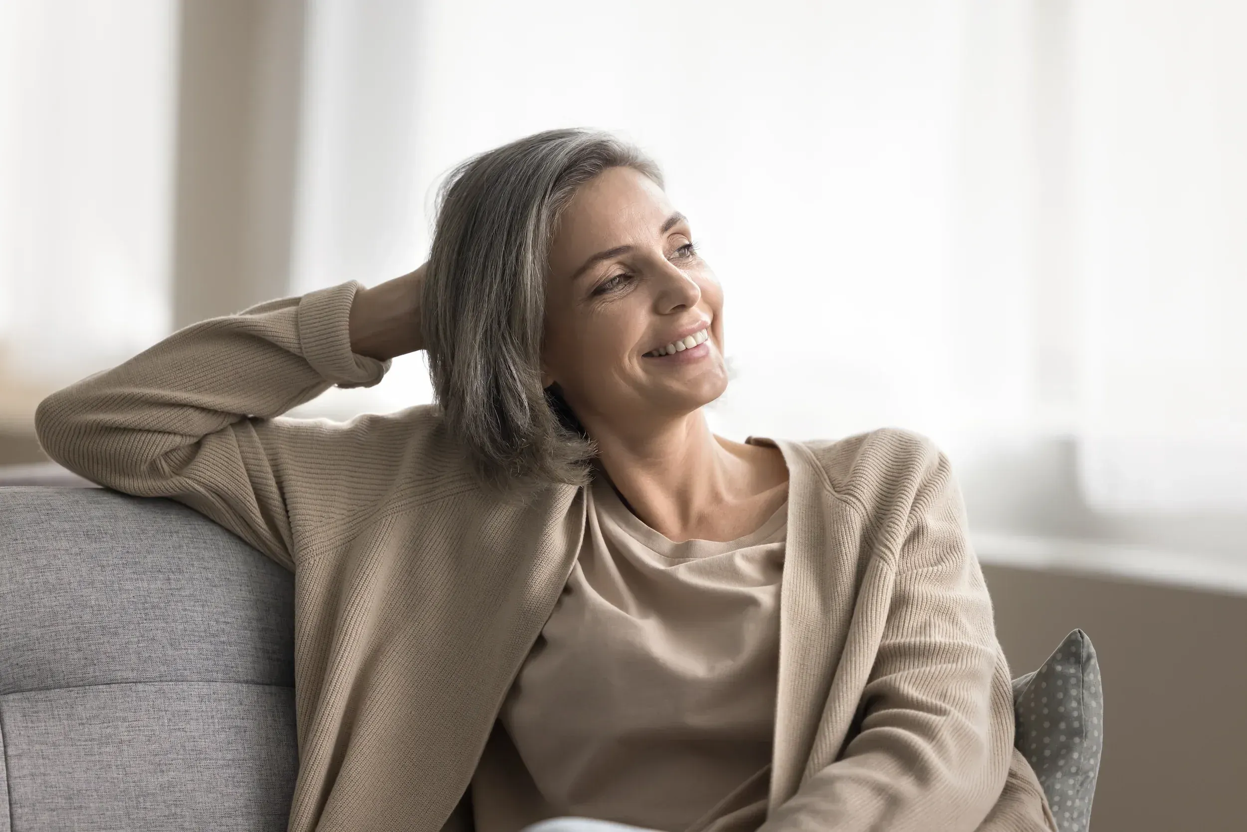 Smiling woman at home with wellness and healthy lifestyle focus
